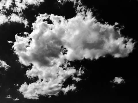 Isolated white clouds on black sky. Set of isolated clouds over black backgro Stock Photos