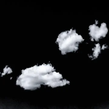 Isolated white clouds on black sky Stock Photos