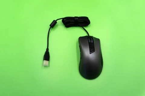 Isolated white computer mouse with black stripe on white background . Stock Photos