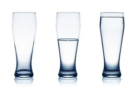 Isolated on white empty, half and full water glasses 库存照片