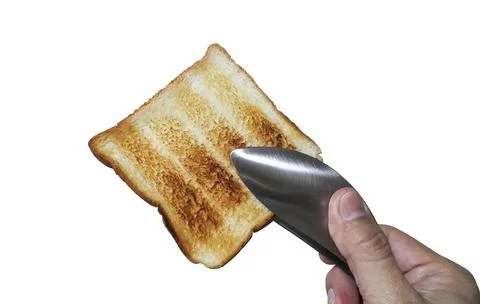 Isolated on white of hand using clamp holding toast Stock Photos