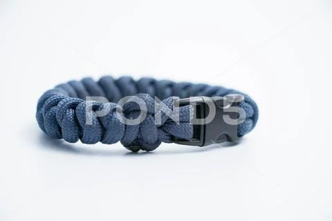 Isolated on white Single survival wristlet bracelet paracord knot Stock Photos