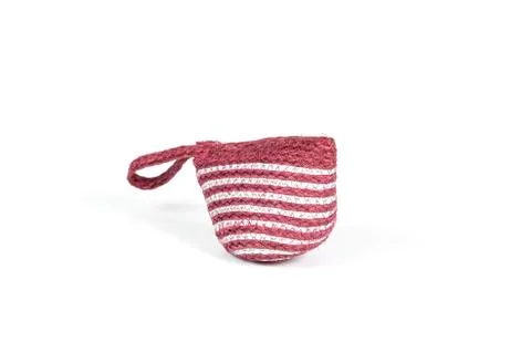 The isolated of the woven bag is rope pattern for money pouch on a white back 库存照片