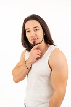 Isolated young bearded long haired handsome confident man in his 30s looking Stock Photos