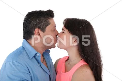 Isolated young casual couple kissing Stock Photos