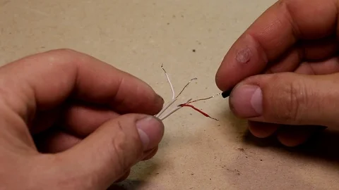 Isolation of all electrical wires shrink tube Stock Footage 100855005