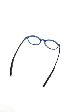 Isolation glasses on white background. Round eyeglass frames with doff blue e Stock Photos
