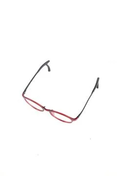 Isolation glasses on white background. Round eyeglass frames with red ear loc Stock Photos