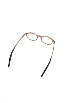 Isolation glasses on white background. round eyeglass frames with doff brown  Stock Photos