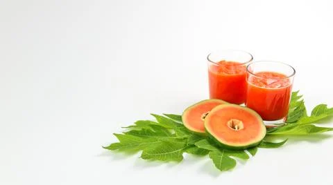 Isolation of papaya juice in glasses on white background Stock Photos