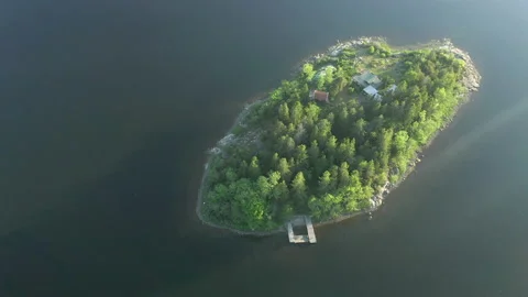 Isolation on remote island with cabin Stock Footage 134168370