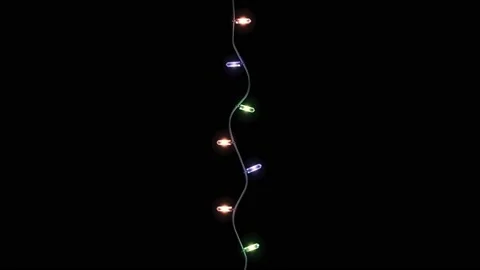Isoleted christmas lights string on black background. Beautiful christmas lights Stock Footage 224621636