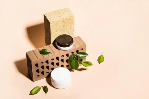 Isometric view of trendy composition made of bricks and Natural cosmetic Stock Photos