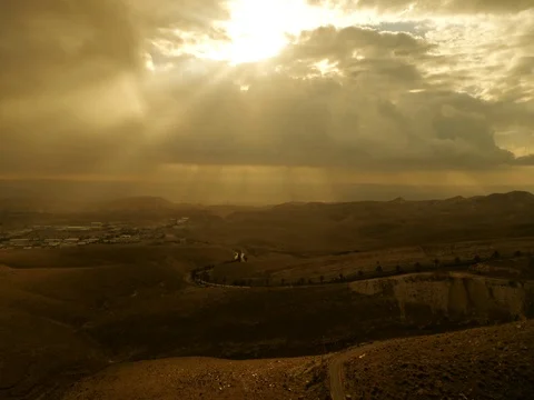 Israel Aerial drone of Middle Eastern camel owners in desert convoy tourism Stock Footage 79080904