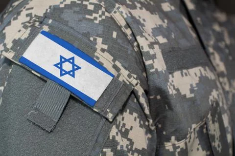 Israel army uniform patch flag on soldiers arm. Military Concept Stock Photos