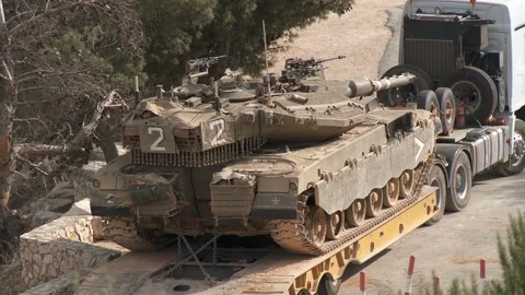 Israel, Circa 2011 - IDF tank driving next to the lebanon border Stock Footage 83633216