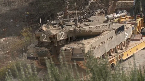 Israel, Circa 2011 - IDF tank driving next to the lebanon border Stock Footage 83633251