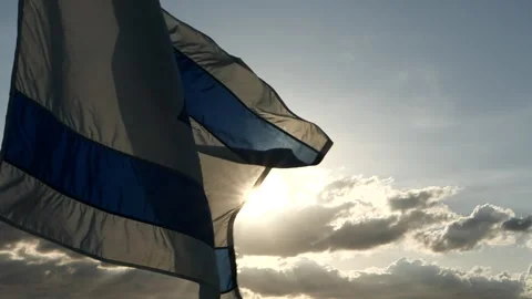Israel flag with star of David over the sunset, waving cloudy sky background Video stock 260406366