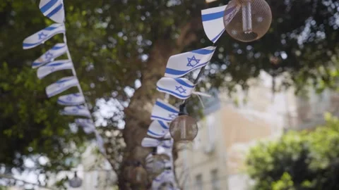 Israel flags blowing in the wind in Tel Aviv Video stock 233776689