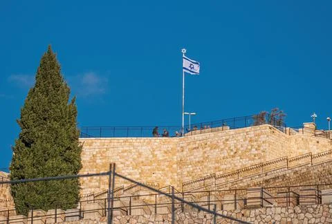 Israel, Jerusalem - January 13: Israeli national flag at Mount of Olives view Stock Photos