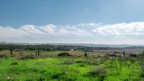 Israel landscape timelapse, clouds moving over green field 스톡 동영상 102358045