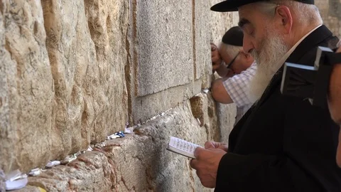 Israel religion, Jewish people pray recite Torah at Western Wall in Jerusalem Stock Footage