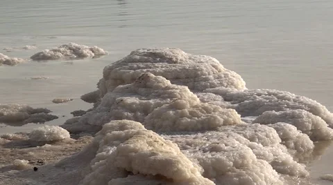 Israel.Dead Sea.Chunks of salt on the surface of the Dead Sea. Stockbeeldmateriaal 68455026