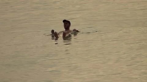 Israel.Dead Sea.Man floating on the surface in the Dead Sea.. Stock-Footage 68454008