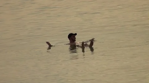 Israel.Dead Sea.Man floating on the surface in the Dead Sea.. Stock Footage 68454147