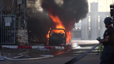 Israeli Car burning. Gaza rocket Stock Footage