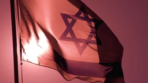 Israeli Flag in the Dawn Rays HD Stock Footage 252597984