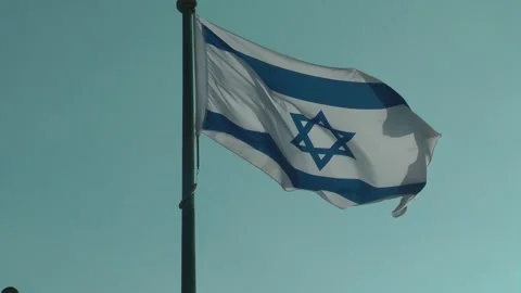 An Israeli flag is flying 動画素材 343388458