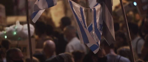 Israeli flags waving during the protests Stock Footage 152849125