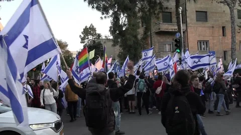 Israeli protesters dancing with flags on Azza St, Jerusalem Video stock 237083544