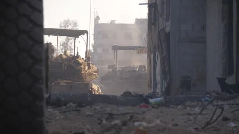Israeli tanks during ground operations in the Gaza Strip killing Stock Footage 277003945