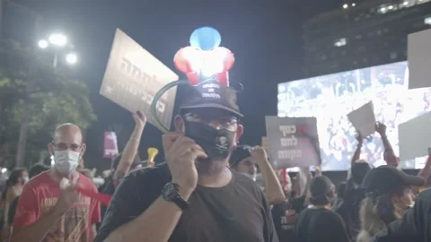 Israelis protest response to economic fallout from virus covid-19 Stock Footage 139496397