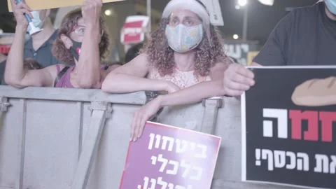 Israelis protest response to economic fallout from virus covid-19 Stock Footage 139496408