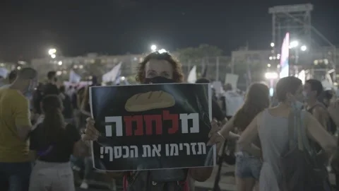 Israelis protest response to economic fallout from virus covid-19 Stock Footage 139496474