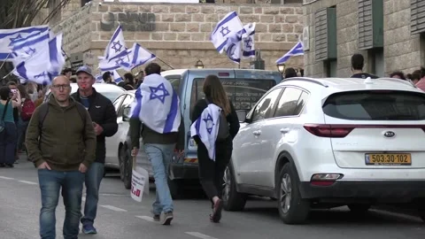 Israelis protesting judicial reforms draped in national flag Video stock 237083586