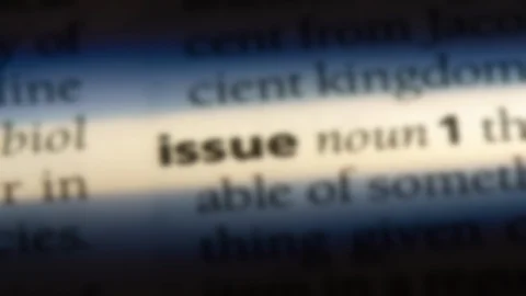 Issue word in a dictionary. Stock Footage 99561675
