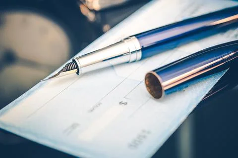 Issuing Payment by Check Stock Photos
