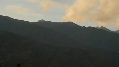 Issyk-Kul Mountain Range Silhouette Against Golden Sunset Clouds Stock Footage 338118918
