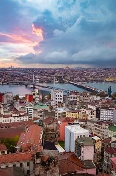 Istanbul cityscape at sunset with dramatic clouds as seen from Galata Tower.. Stock Photos