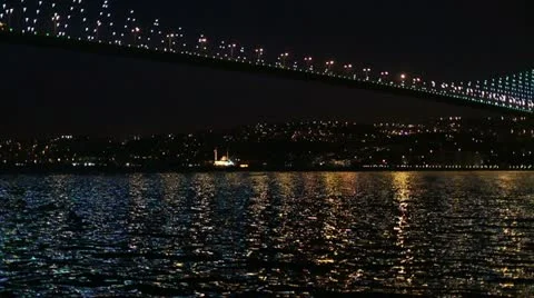 Istanbul night city and bosporus bridge Stock Footage