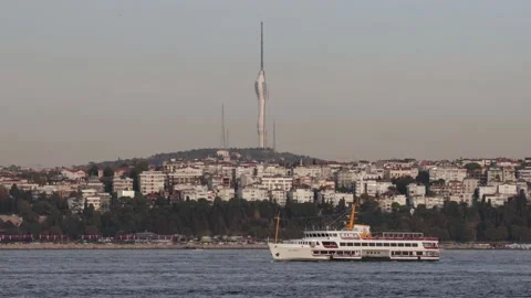 Istanbul single local ship is passing in bosporus Camlica TV tower Video stock 140873558