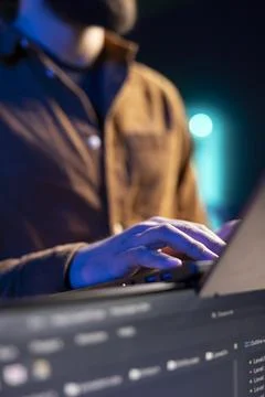 IT admin in apartment fixing coding issues using laptop, close up 스톡 사진