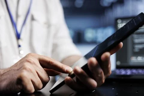 IT admin coding in data center 写真素材