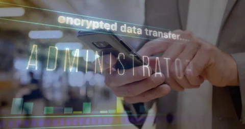 IT admin tapping smartphone screen in open office, activating encrypted transfer Stock Footage 310970803