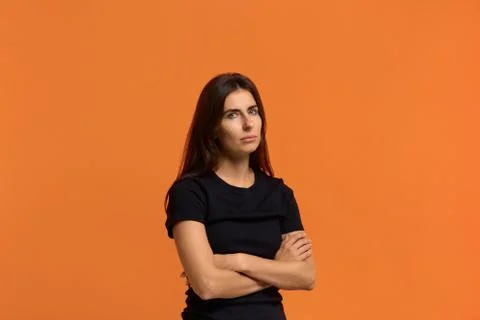 It is a big problem for me. Contemplative caucasian woman in black t-shirt ke Stock-Fotos