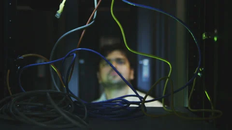 IT businessman inspects data center servers. Working in computer server room Vídeo Stock 32723403